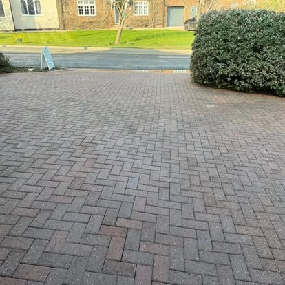 The same block-paved driveway after cleaning